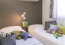 Stacaravan Panorama kinderkamer op camping Kostarmoor
