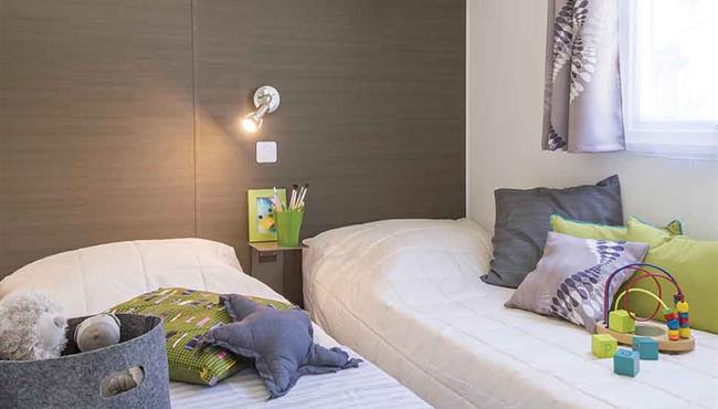 Stacaravan Panorama kinderkamer op camping Kostarmoor